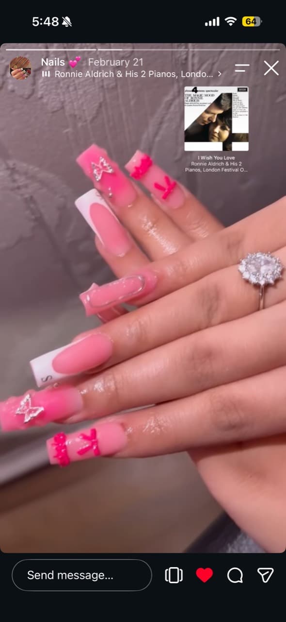 Luna’s pink and white French nails with hot pink bows and sparkling butterfly details
